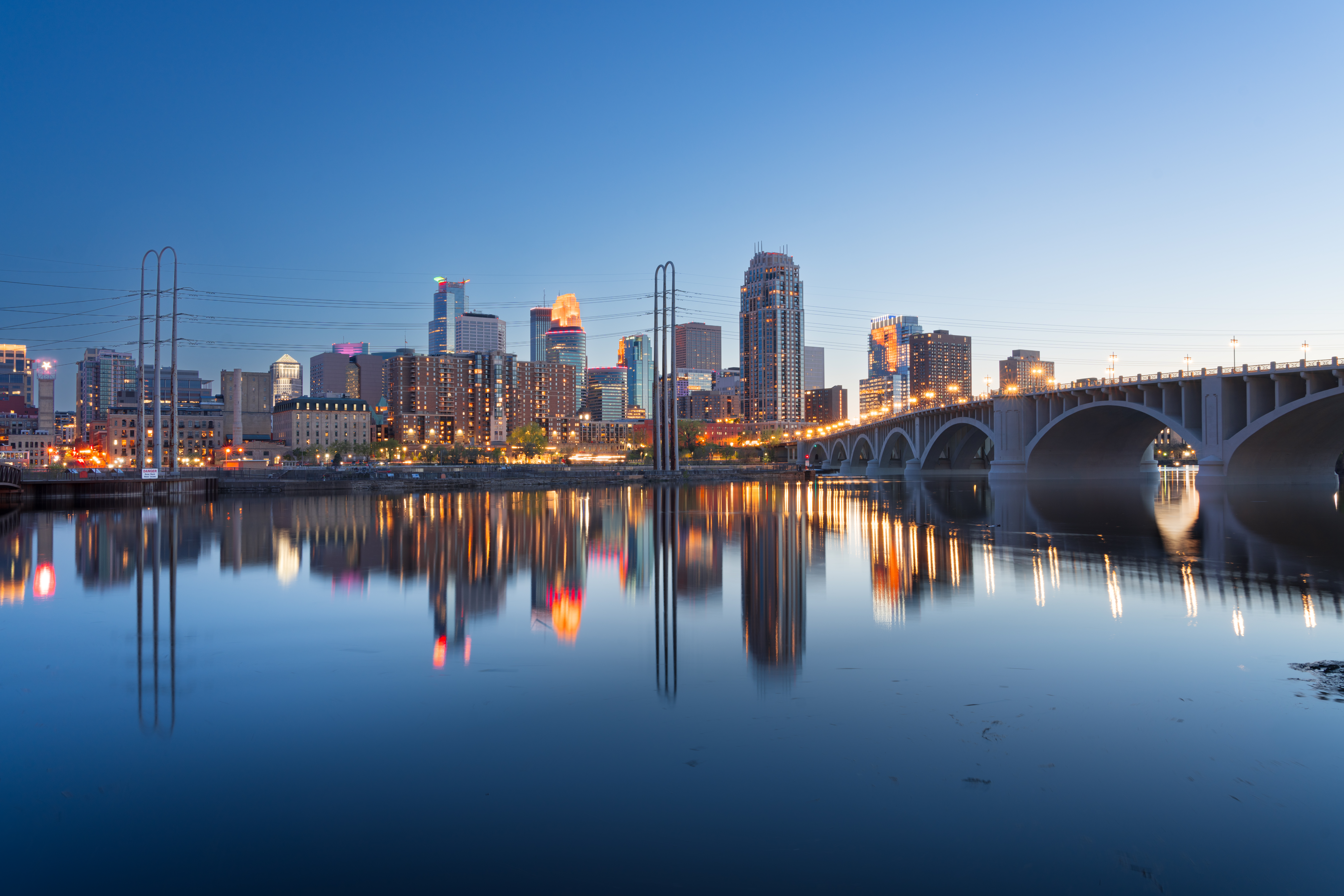 Minneapolis, Minnesota, USA downtown city skyline on the Mississippi at dusk.